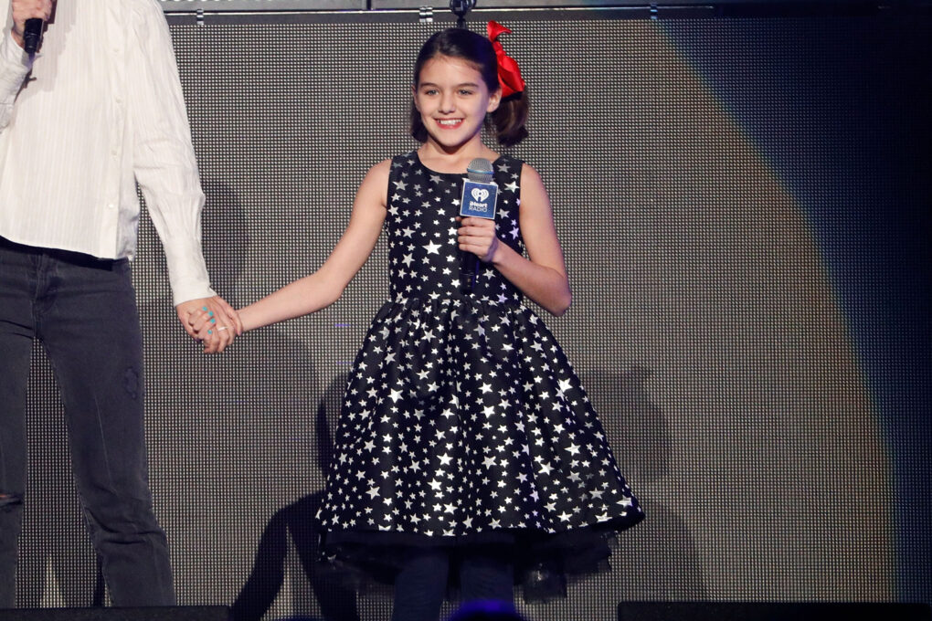 Katie Holmes and Suri Cruise perform...<div class=