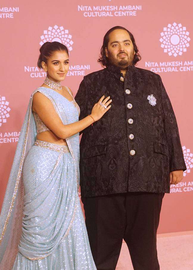 Anant Ambani pictured with his wife-to-be, Radhika Merchant. Credits: Prodip Guha/Getty Images