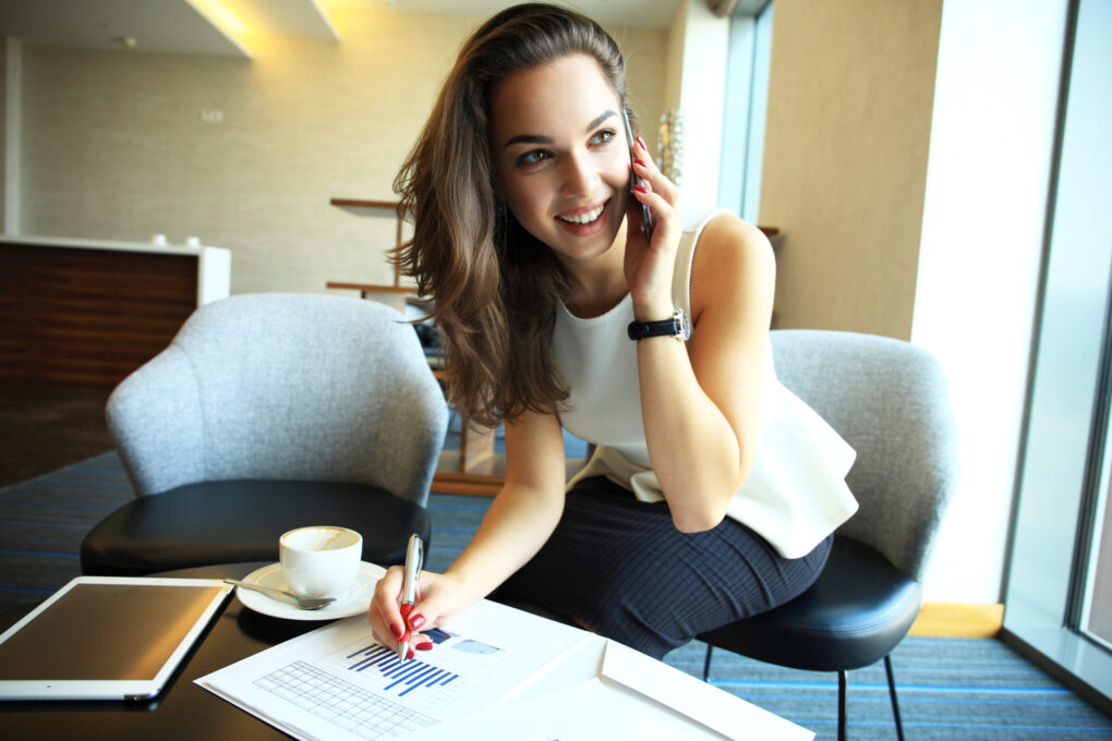 A woman talking on the phone | Source: Shutterstock