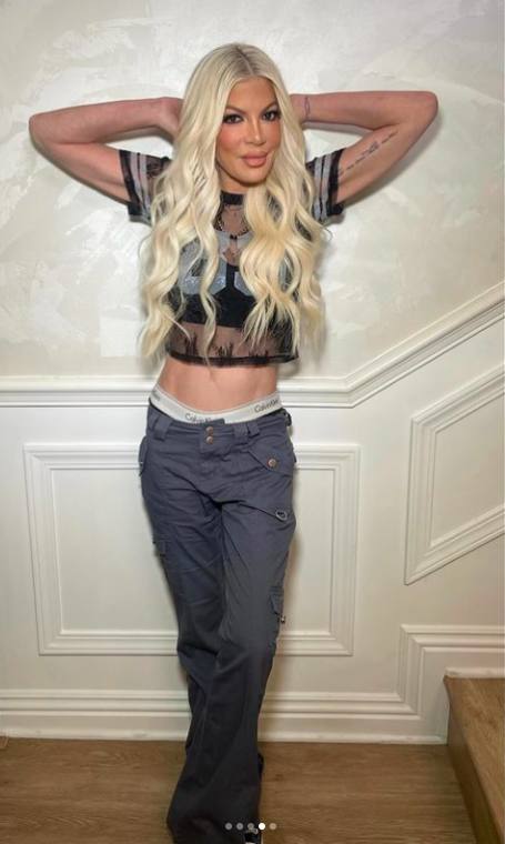 Tori Spelling posing for a picture posted on March 13, 2024 |...<div class=